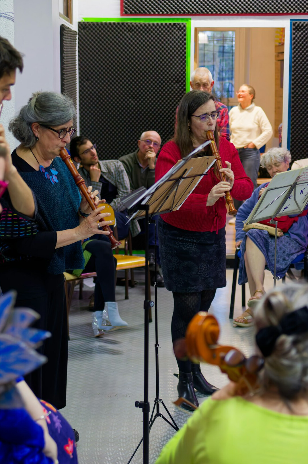 Elderly choir singing together in a community hall