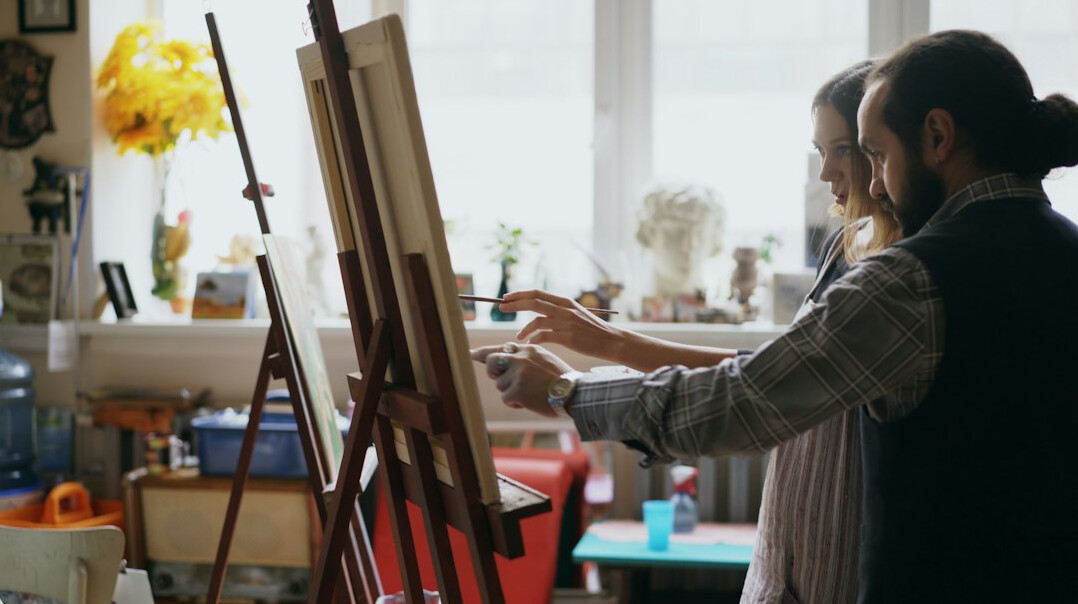 seniors painting in art class