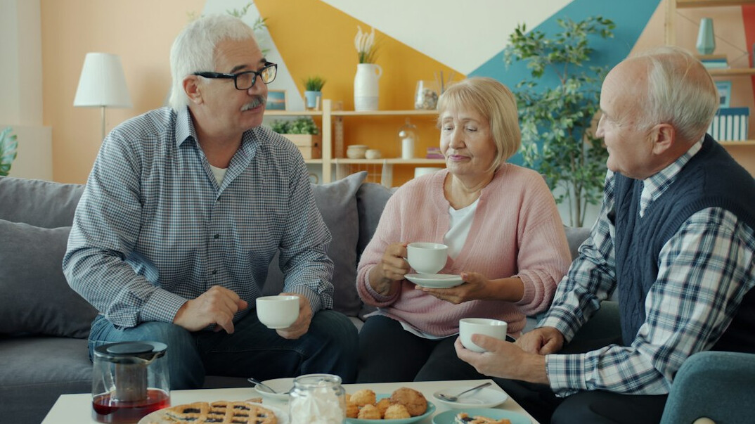 seniors laughing in living room